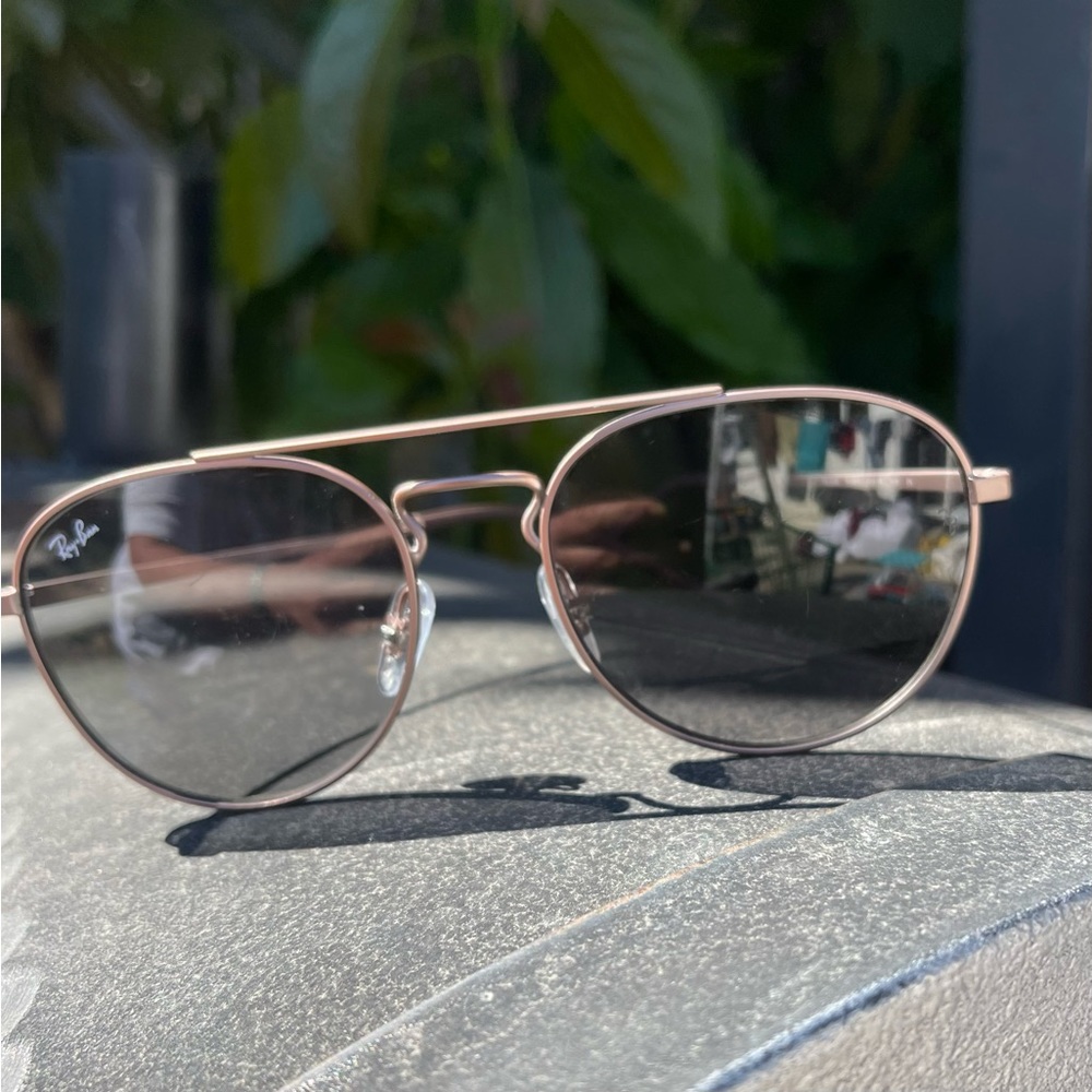 RayBan Aviator Sunglasses. Minor scratches on lenses. Metallic bronze color.